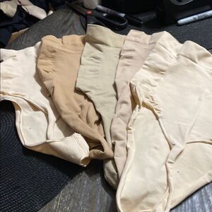 SKIMS Cream and Tan high waisted sculpting thong